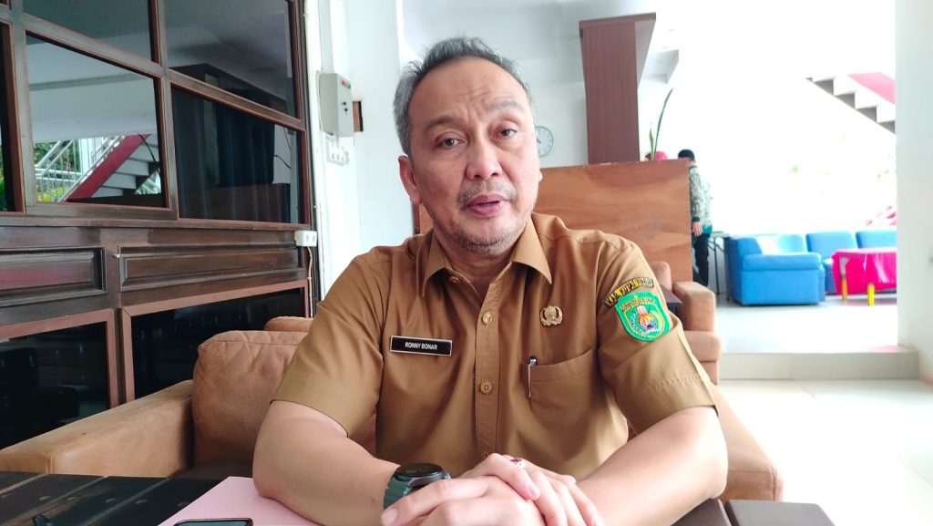 Diskominfo Kutim Dorong Optimalisasi PPID dengan Sistem Terintegrasi Kepala Diskominfo Staper Kabupaten Kutai Timur, Ronny Bonar H. Siburian