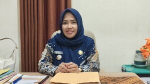 Kepala Desa Suka Rahmat, Hasnawati,
